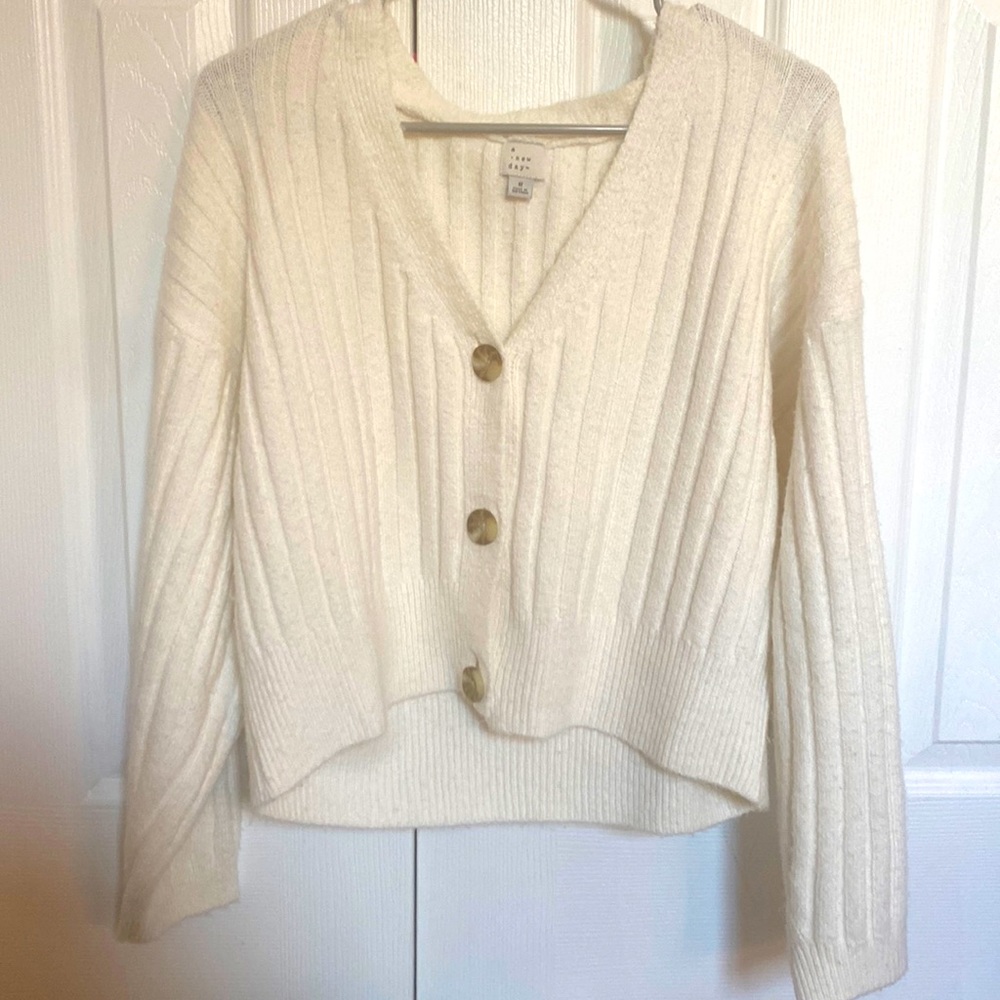 a new day sweater, size small